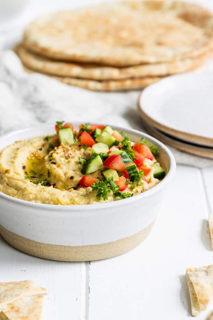 Hummus Served in a White Bowl