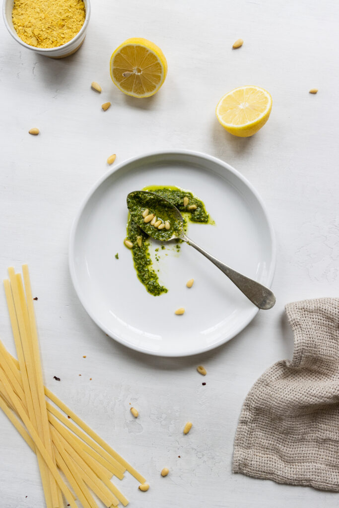 Vegan basil pesto served on a white plate