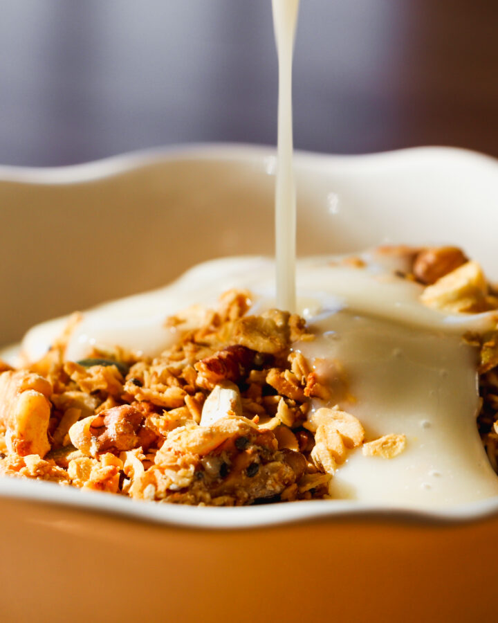 Pear Cream served with granola in a white bowl