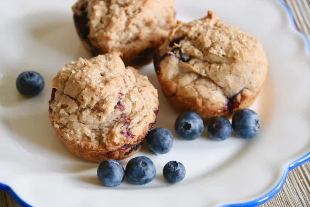 Easy Gluten-free Blueberry Muffins served on a white plate