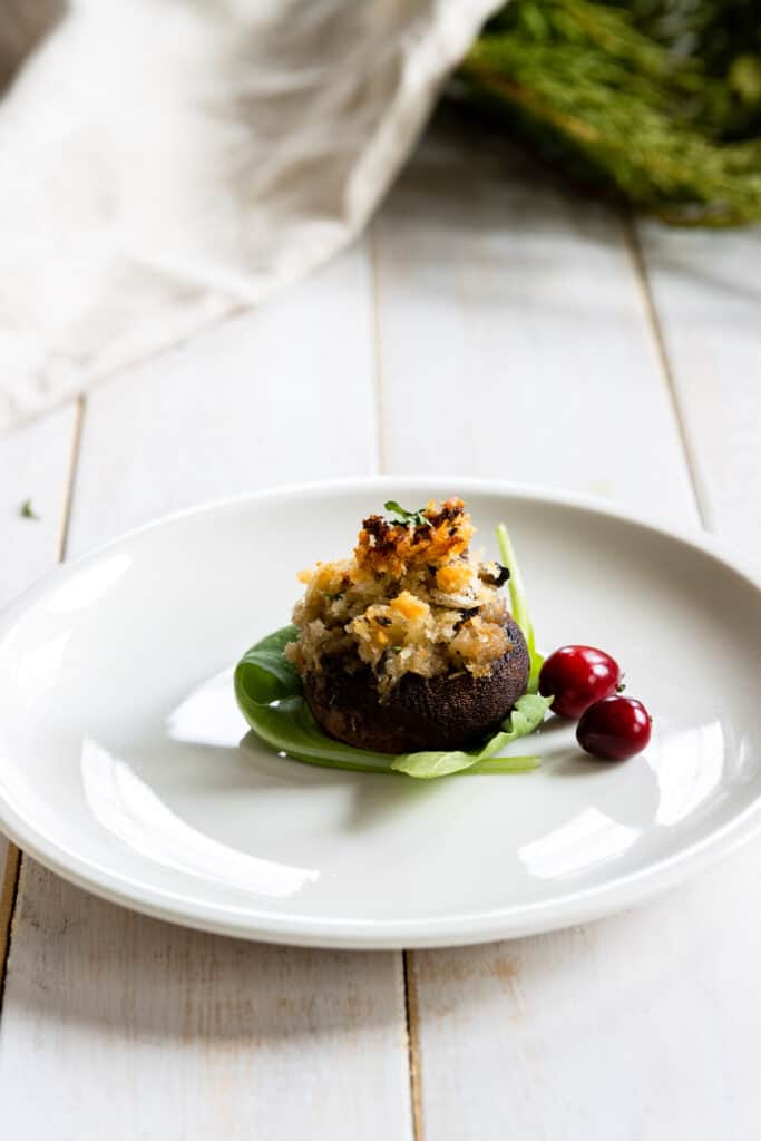 Vegan Stuffed Mushroom served on a white plate