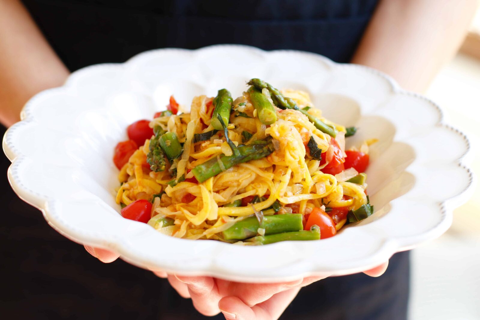 Summer Squash Noodles served in a white bowl