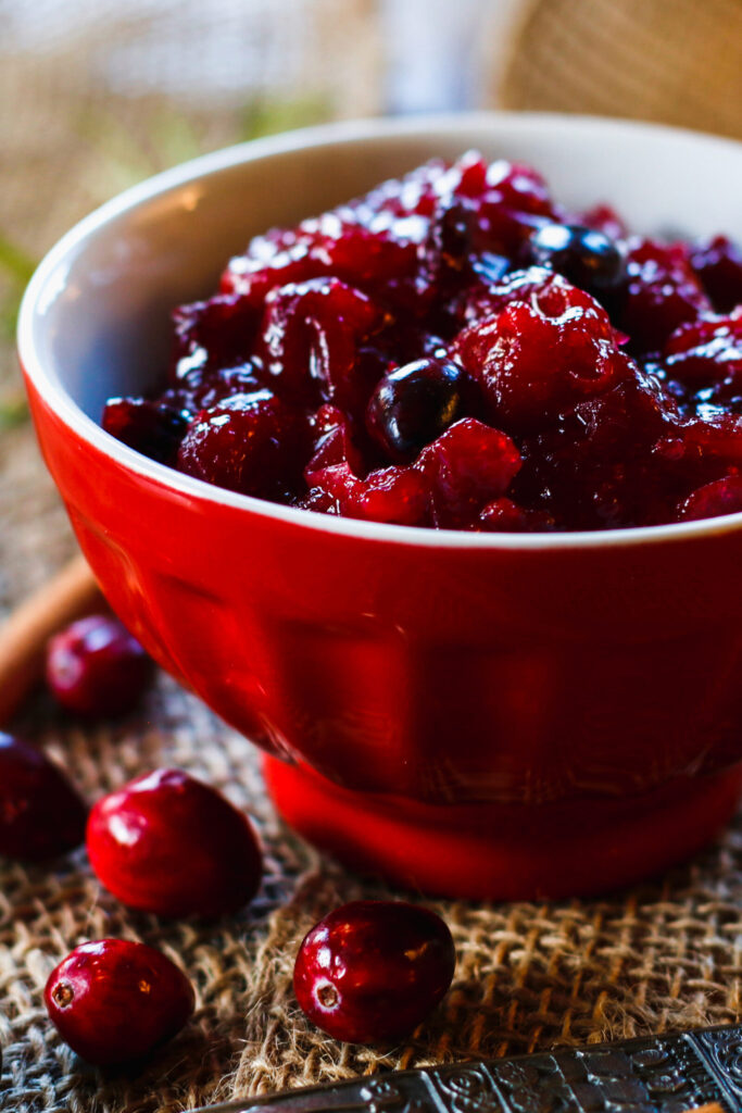 Homemade Cranberry Sauce served in a red bowl