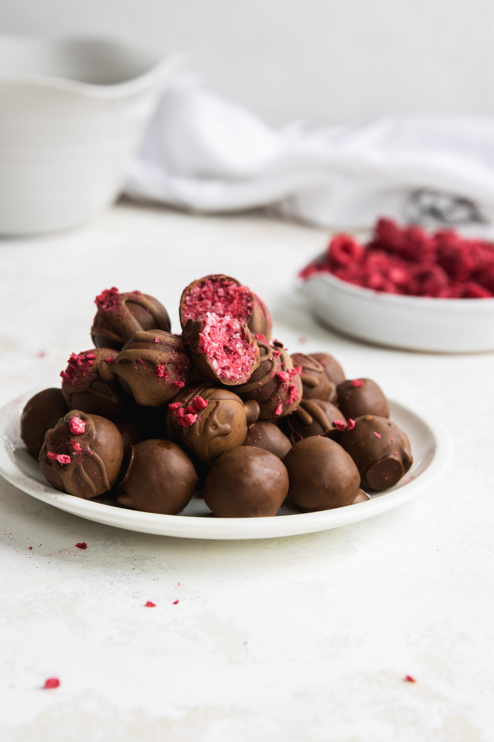 Vegan Raspberry Truffles served on a white plate