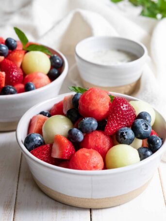 Summer Fruit Salad with Lime Mint Dressing in a bowl