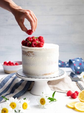 Vegan Lemon Raspberry Cake on a Cake Stand
