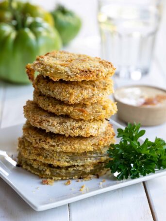 Baked Fried Green Tomatoes Served on a white plate