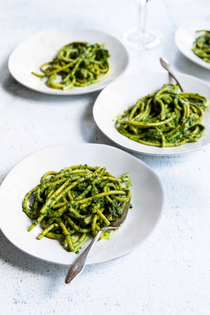 Vegan One-Pot Mushroom Pesto Pasta on Three Plates