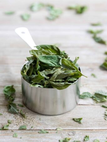 Freeze Dried Basil in a measuring cup
