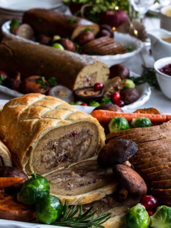 Holiday Roast on a serving plate with mushrooms