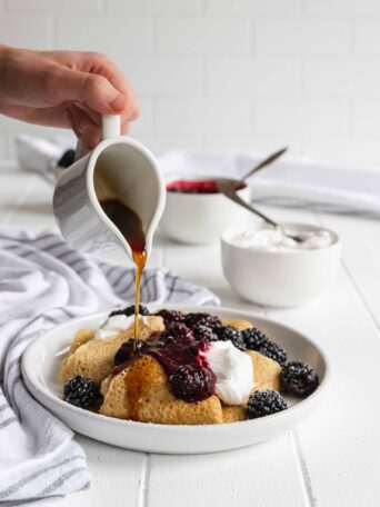 Crepes with Lemon Cream Cheese and Blackberry Filling with a drizzle of maple syrup