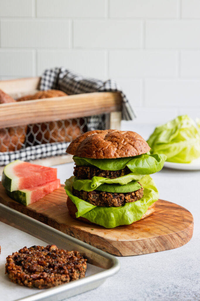 Mushroom Oat Burgers served with lettuce and watermelon