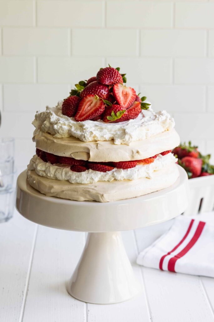 Pavlova with vegan whipped cream and strawberries