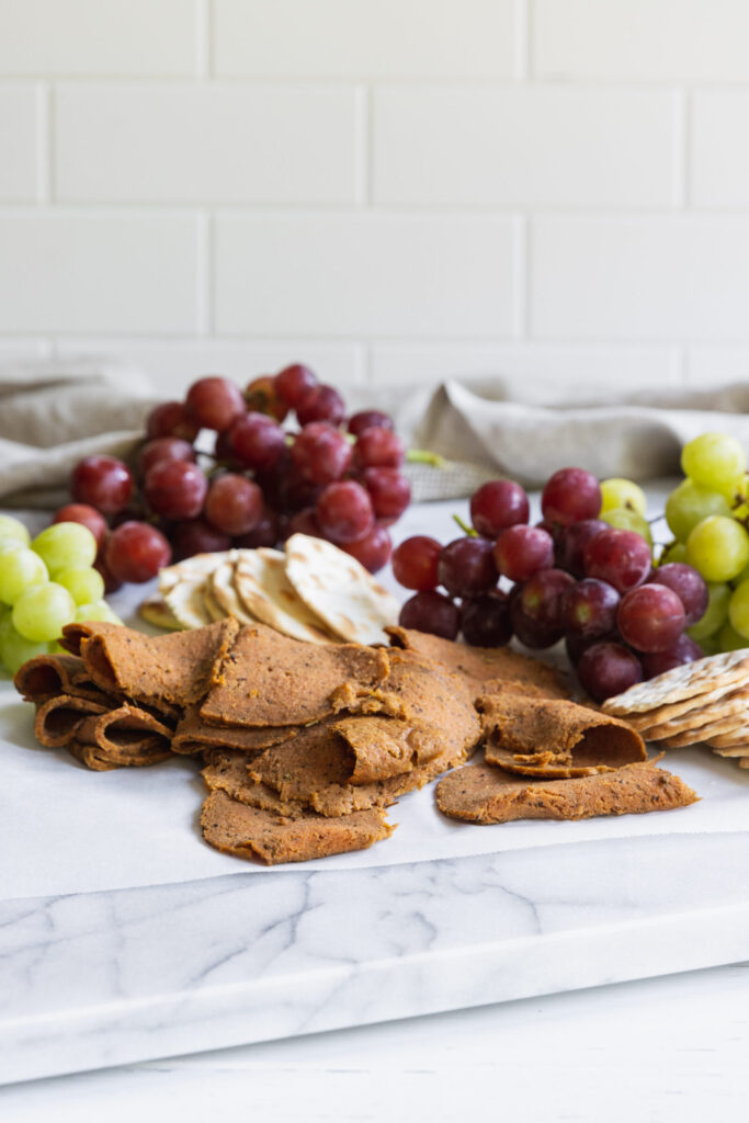 Plant-Based Deli Meat served with grapes