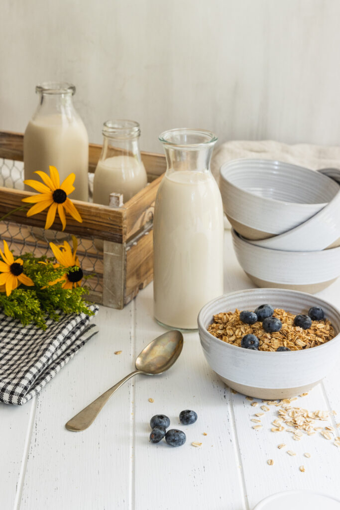 Fresh Oat Milk served with cereal and blueberries