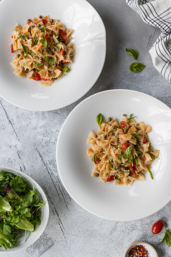 Gluten-Free One-Pot Pasta served in two white pasta dishes