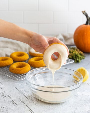 Dipping the Pumpkin Donuts in Maple Glaze