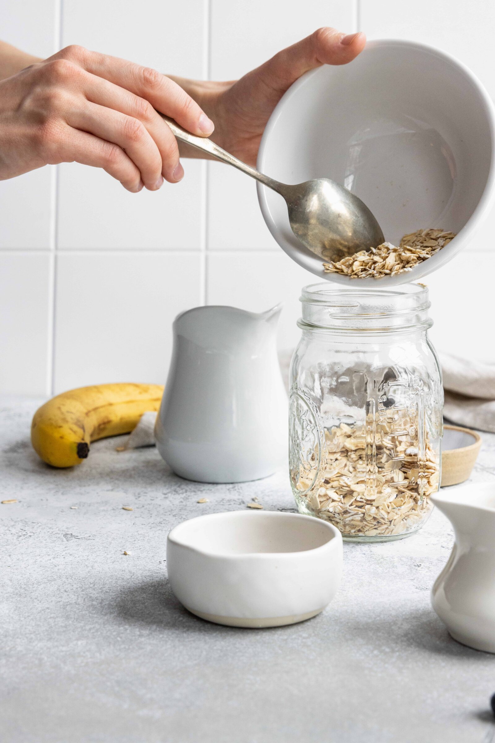 Adding Oats to a Mason Jar