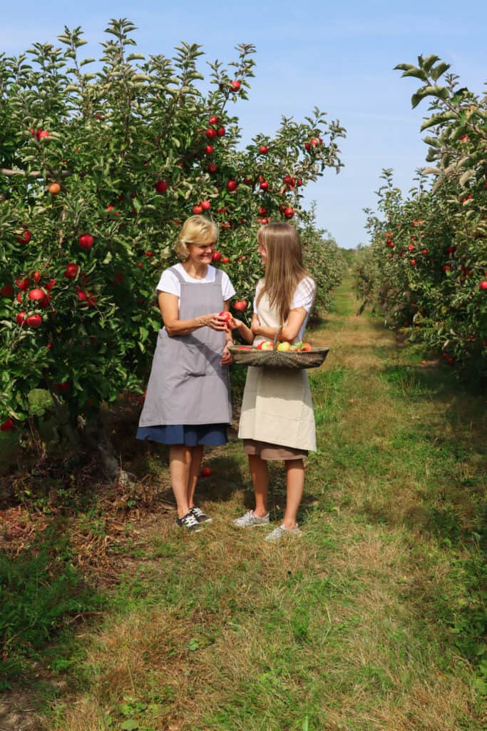 Chef Ani and her Mom in an Apple orchard.