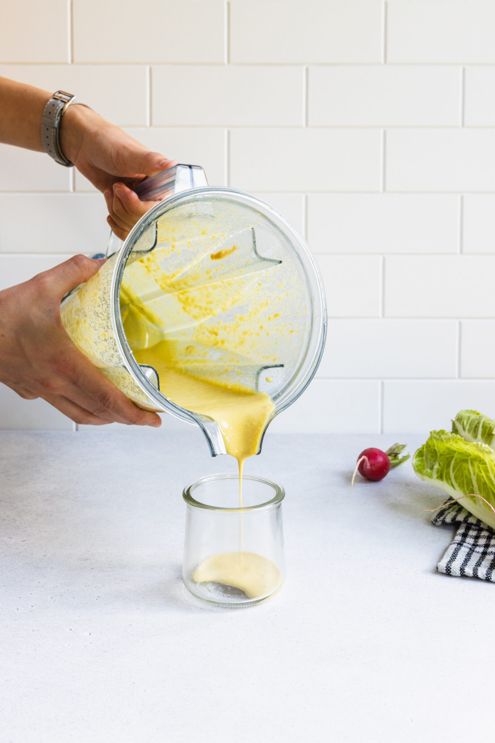 Pouring Salad Dressing into a Jar