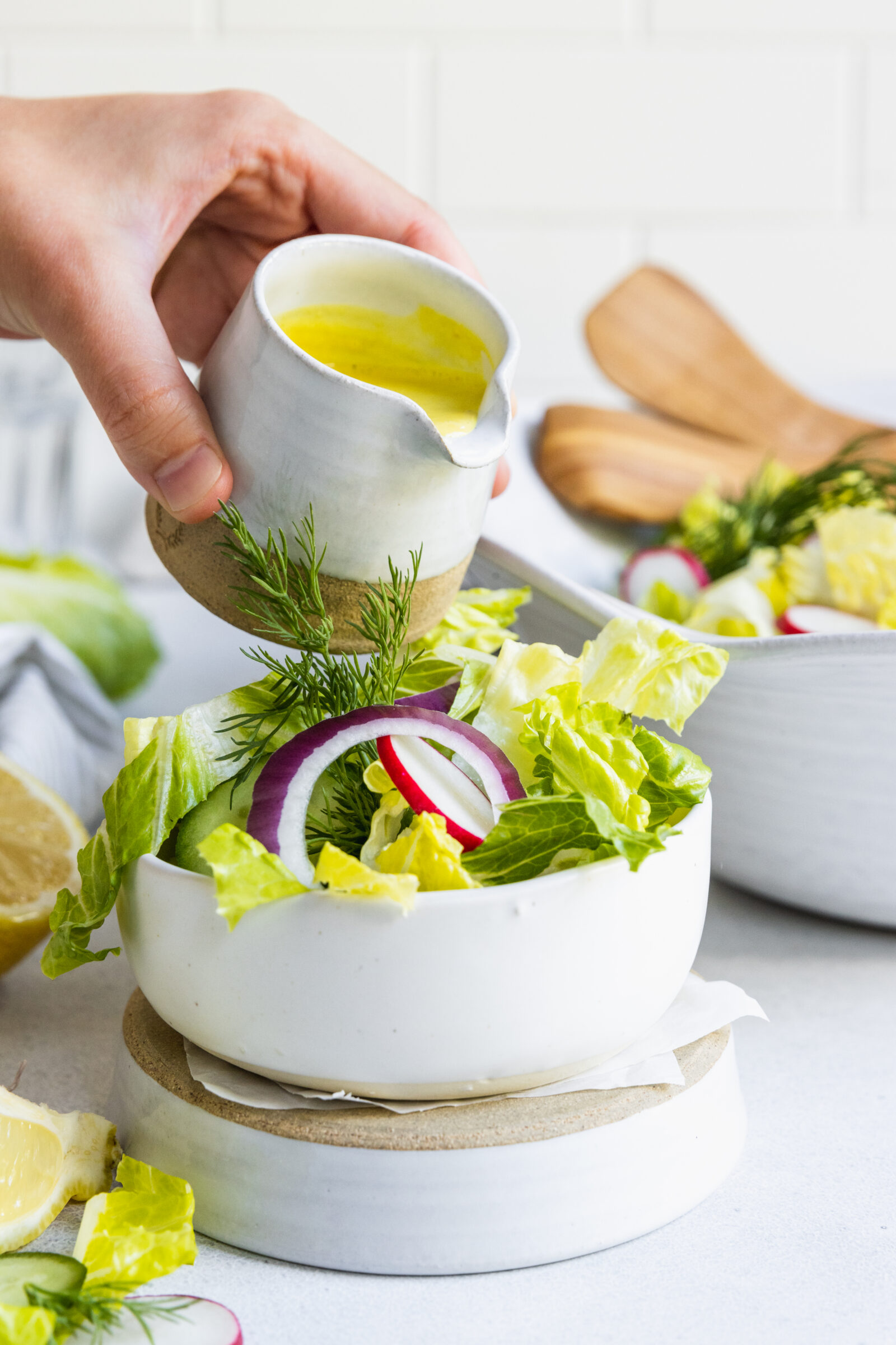 A bowl of Salad with Tahini Salad Dressing