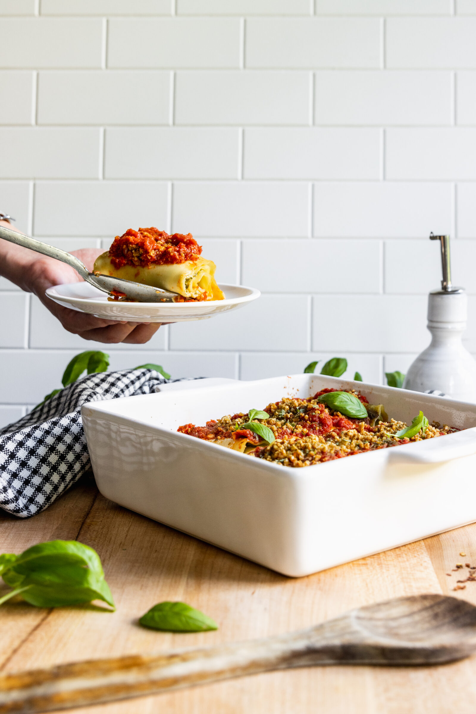 Vegan Lasagna Roll Ups on a white plate