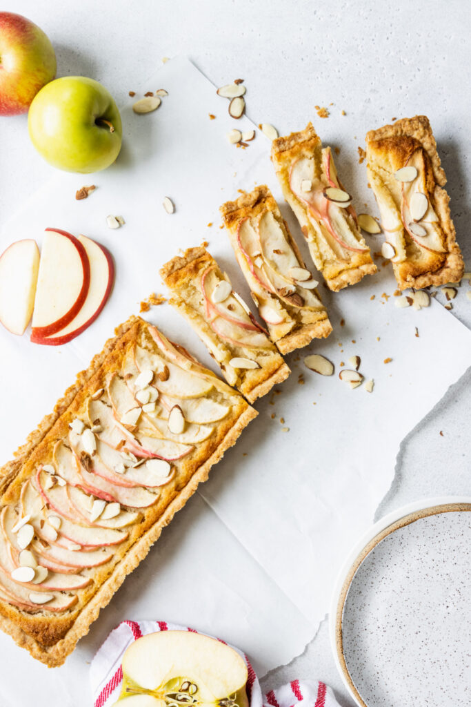 Vegan Apple Tart with sliced apples and almonds