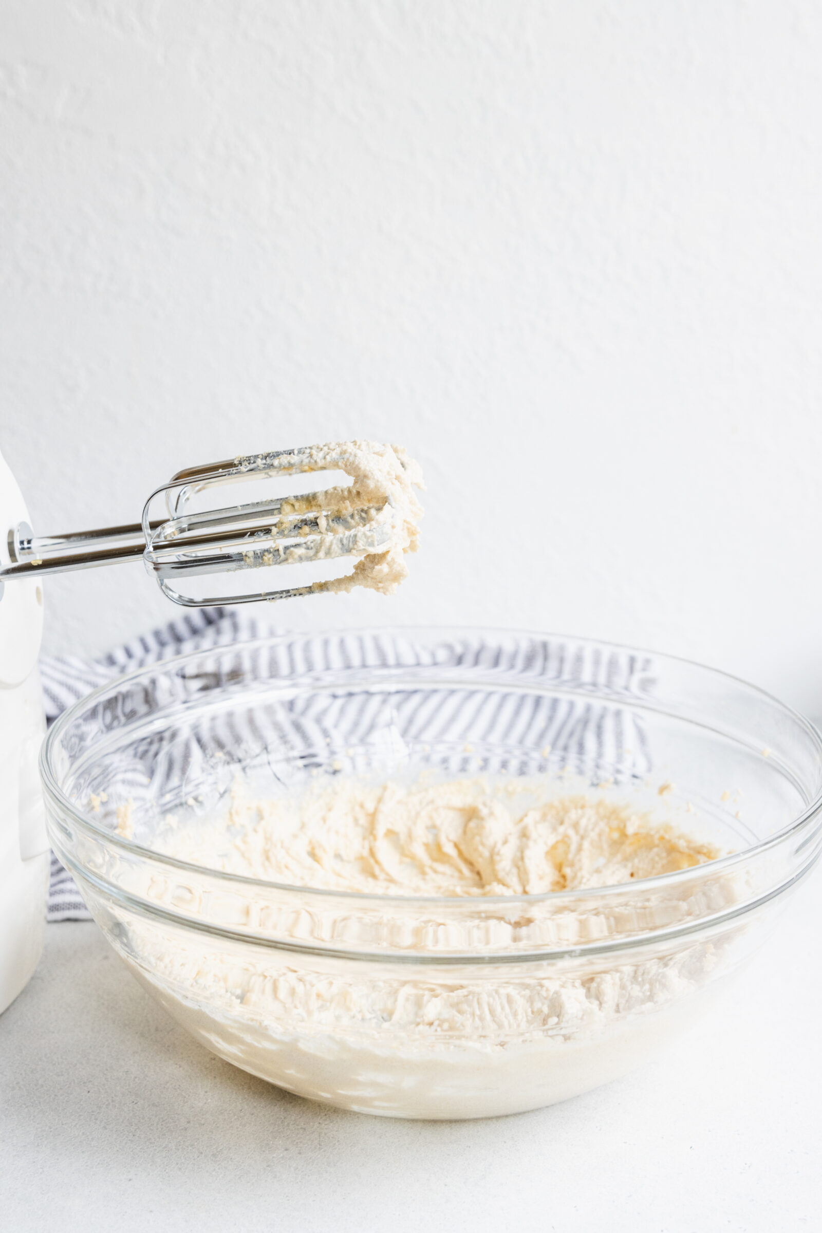 Creaming the plant-based margarine and sugar for vegan pumpkin cookies