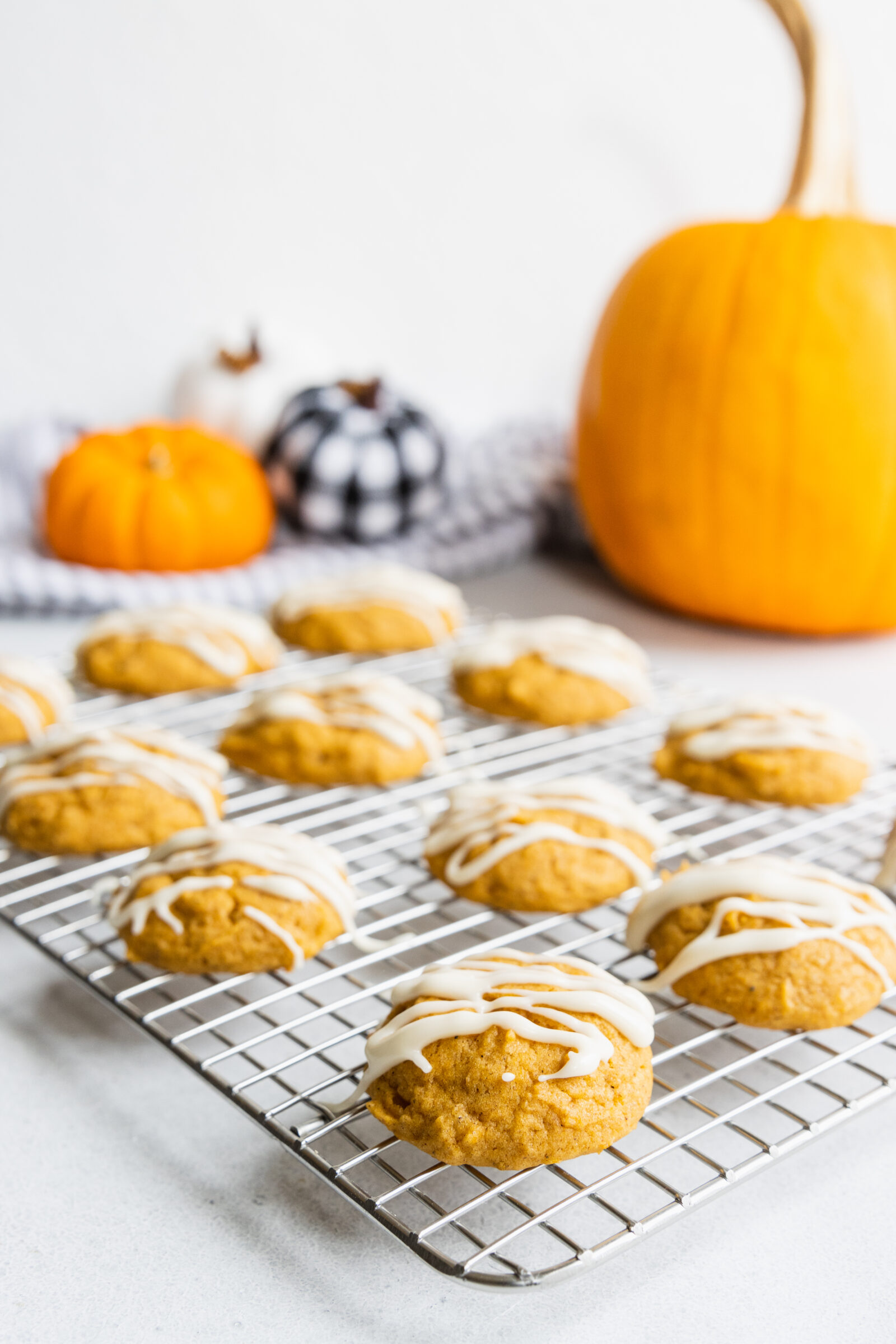 Vegan pumpkin cookies on a cooling rack