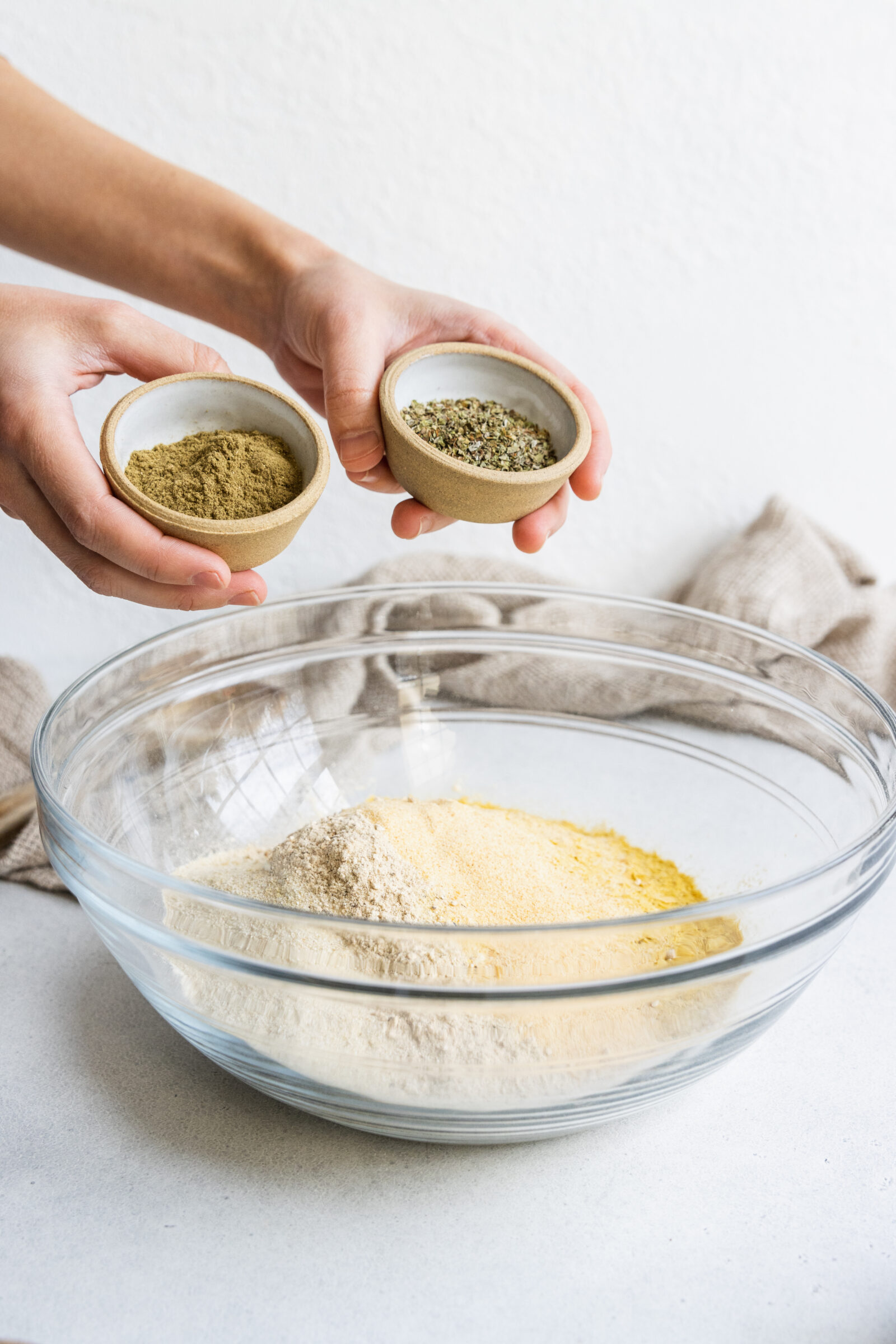 Adding dried sage and thyme to the vegan turkey roast dry ingredients