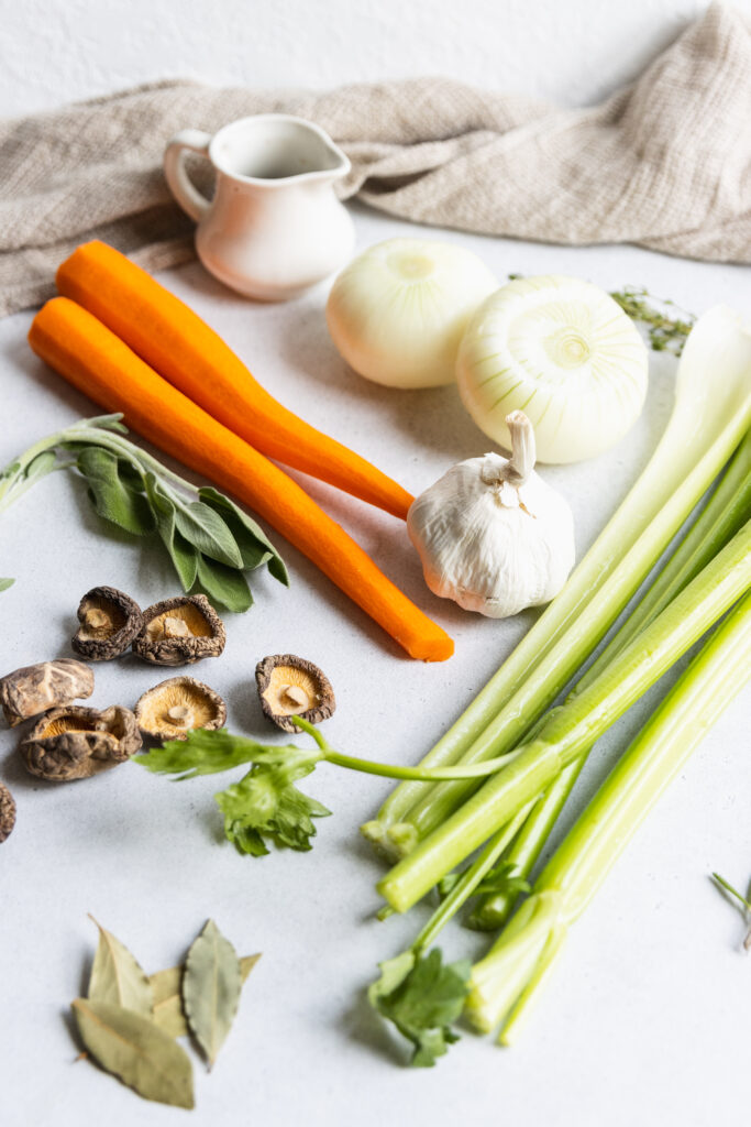 Broth ingredients; carrots, onion, garlic, dried mushrooms, and herbs