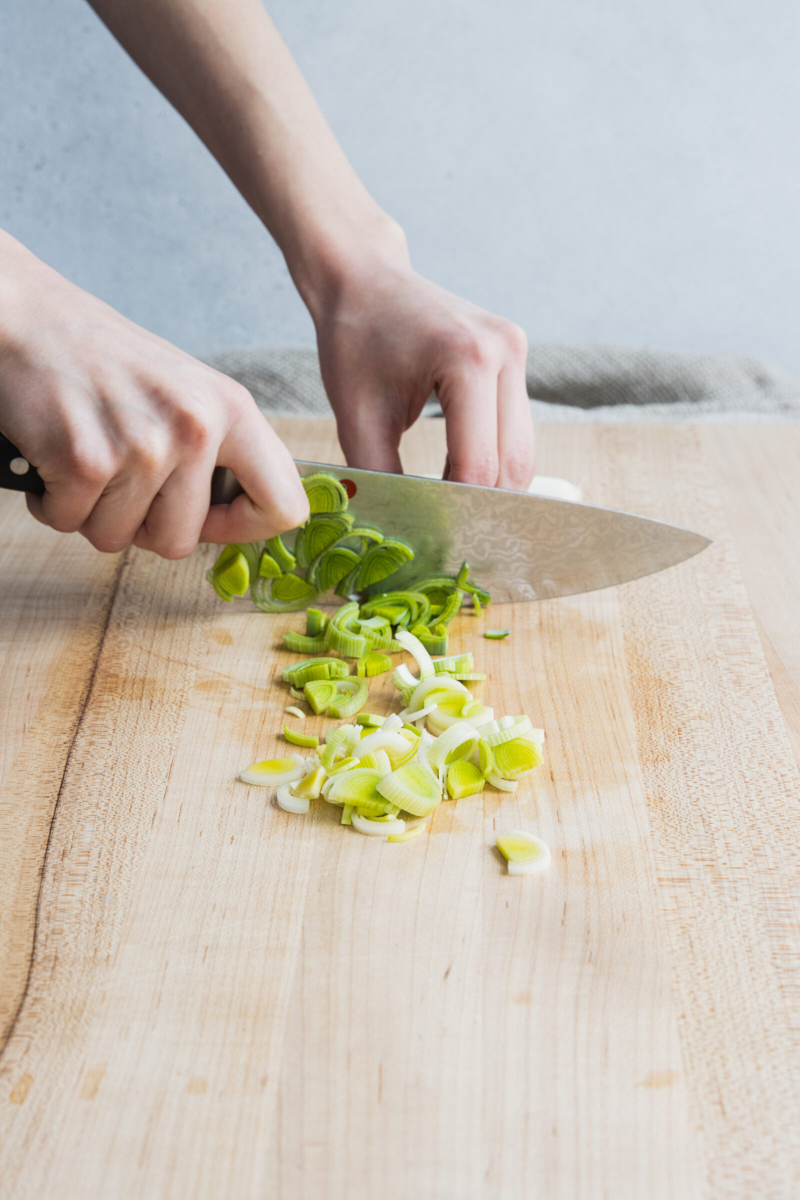 Chopping leek for the potato kale soup