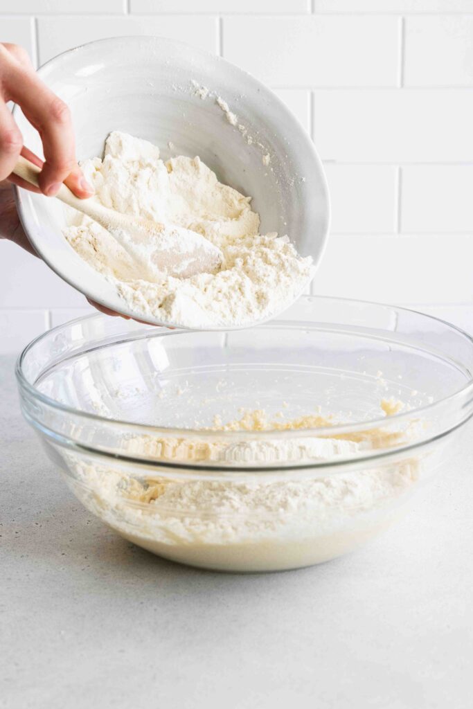 Adding half the flour mixture
