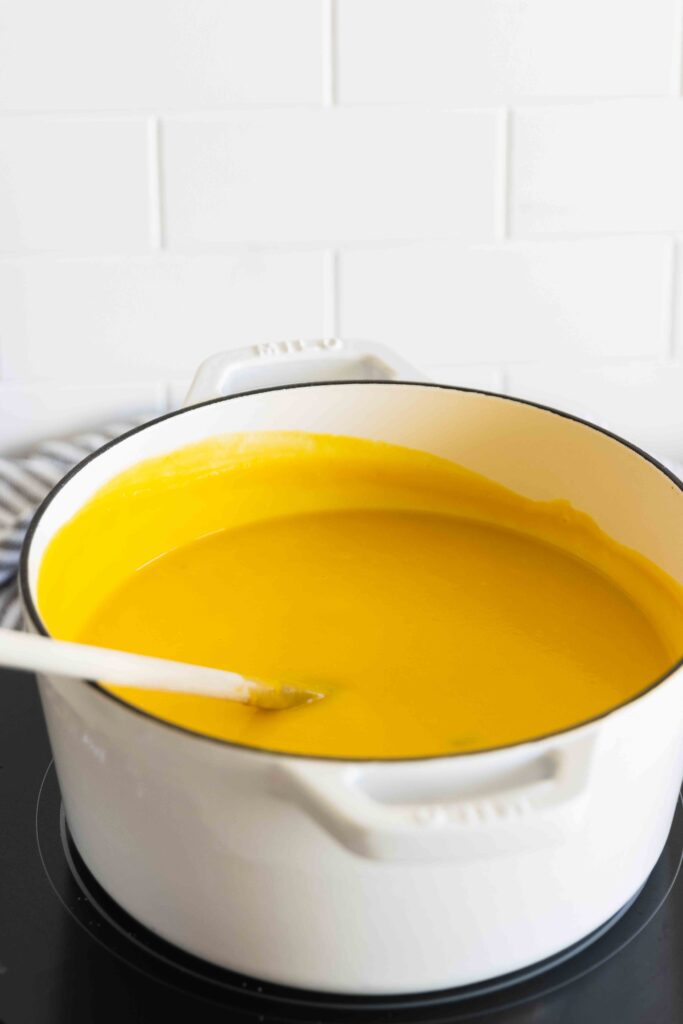 Warming the sauce on the stove