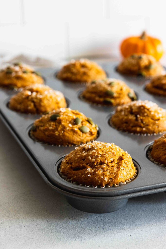 Vegan Pumpkin Muffins fresh from the oven in a muffin tin