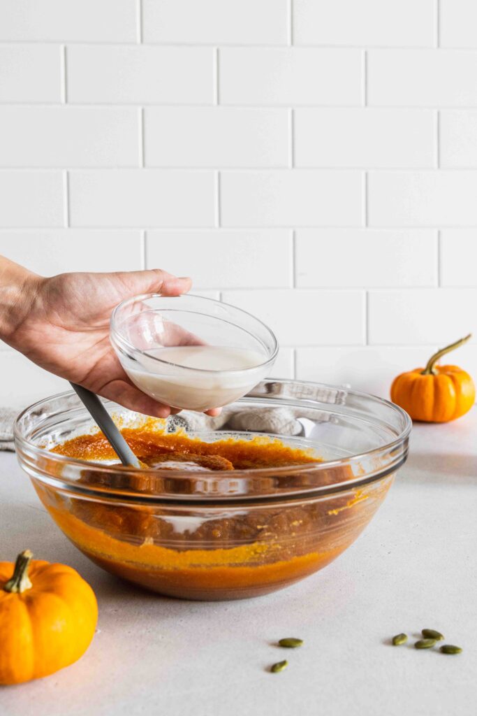 Adding almond milk to the wet ingredients