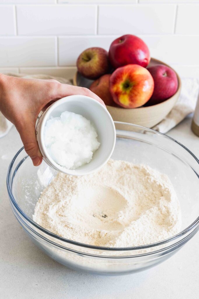 Adding coconut oil to dry mixture