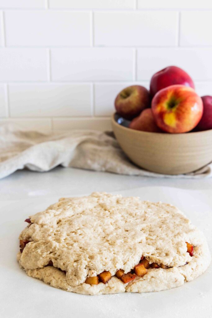 Spread the scone dough on top of the filling