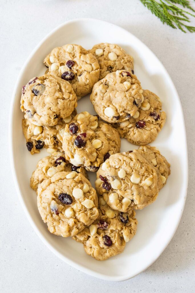 Cranberry white chocolate chip cookies served on a white platter