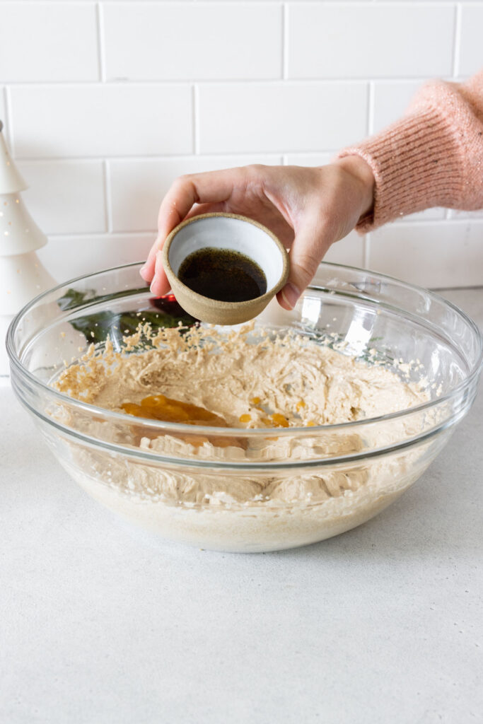 Adding vanilla bean paste to the wet mixture
