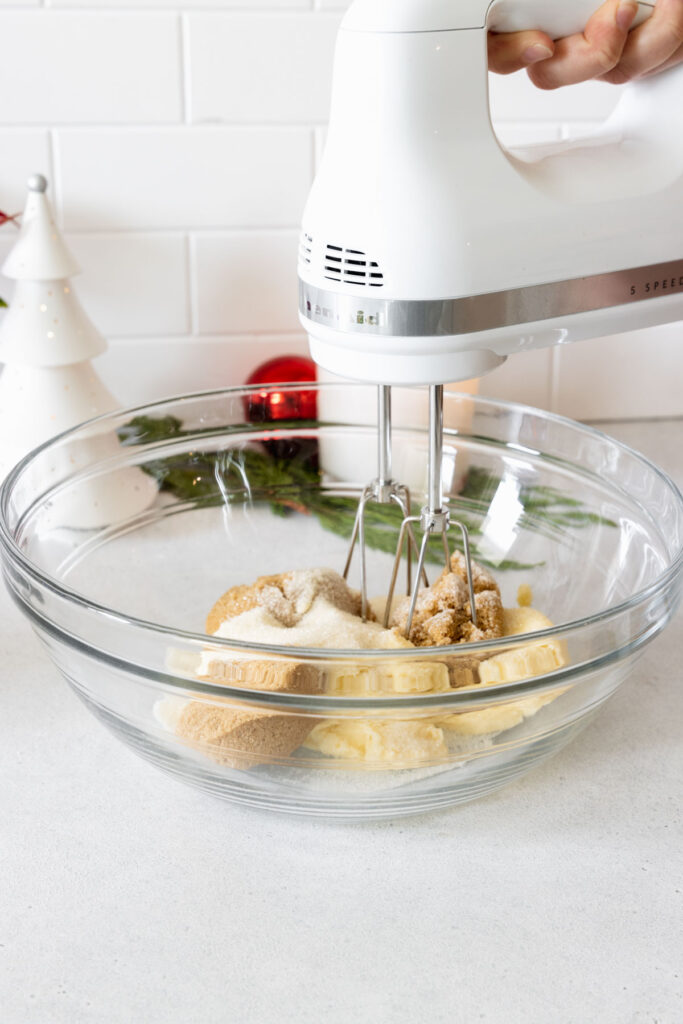 Margarine, sugar, and brown sugar in a glass bowl