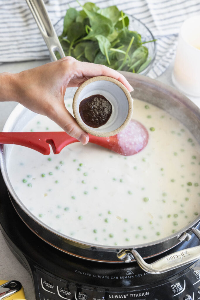Adding Better than Bouillon to the cream sauce