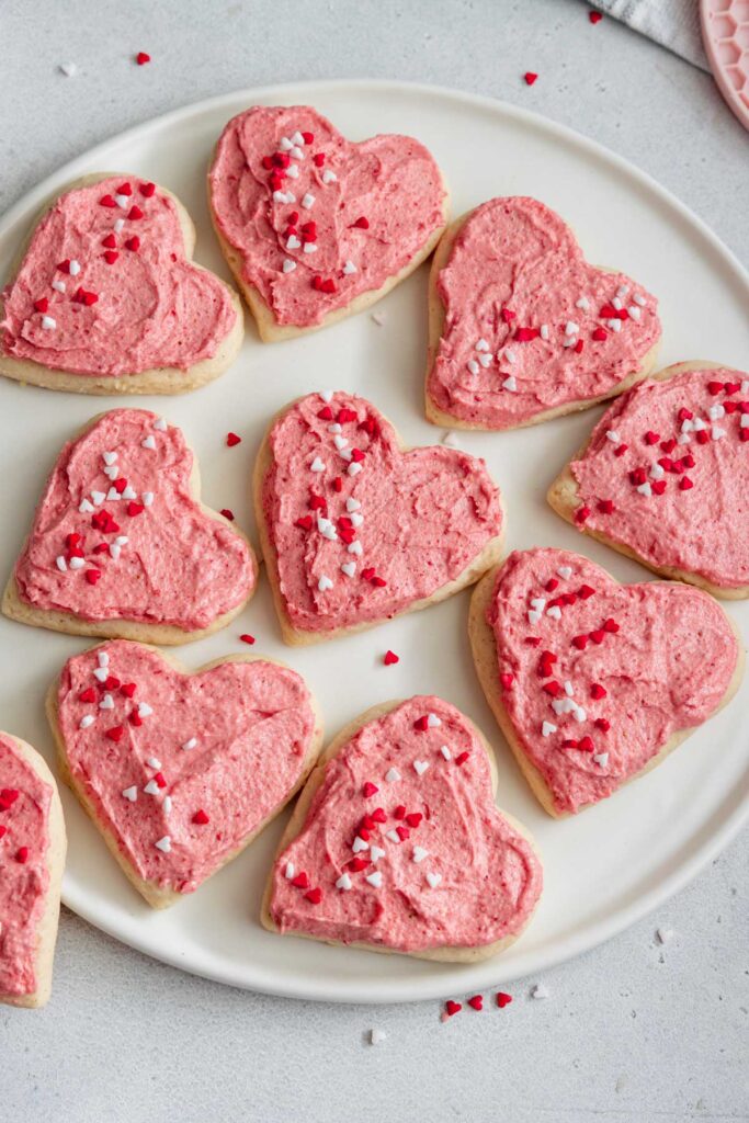 A plate of frosted sugar cookies