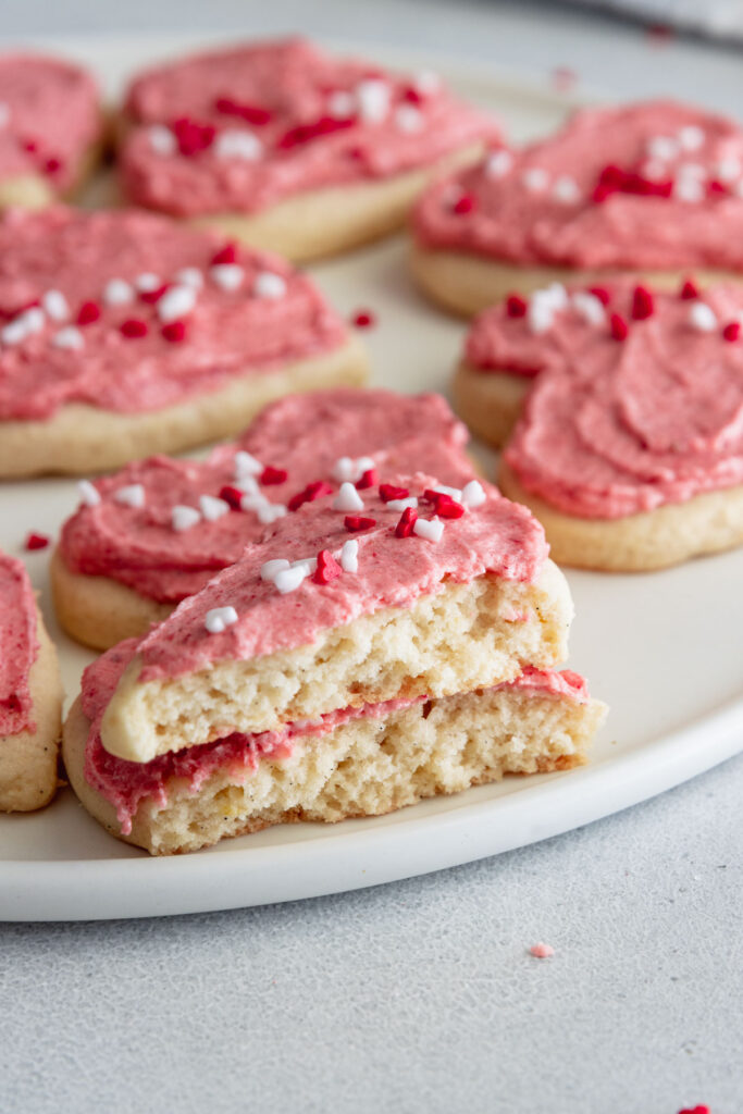 Sugar cookie broken in half to show the inside cookie texture