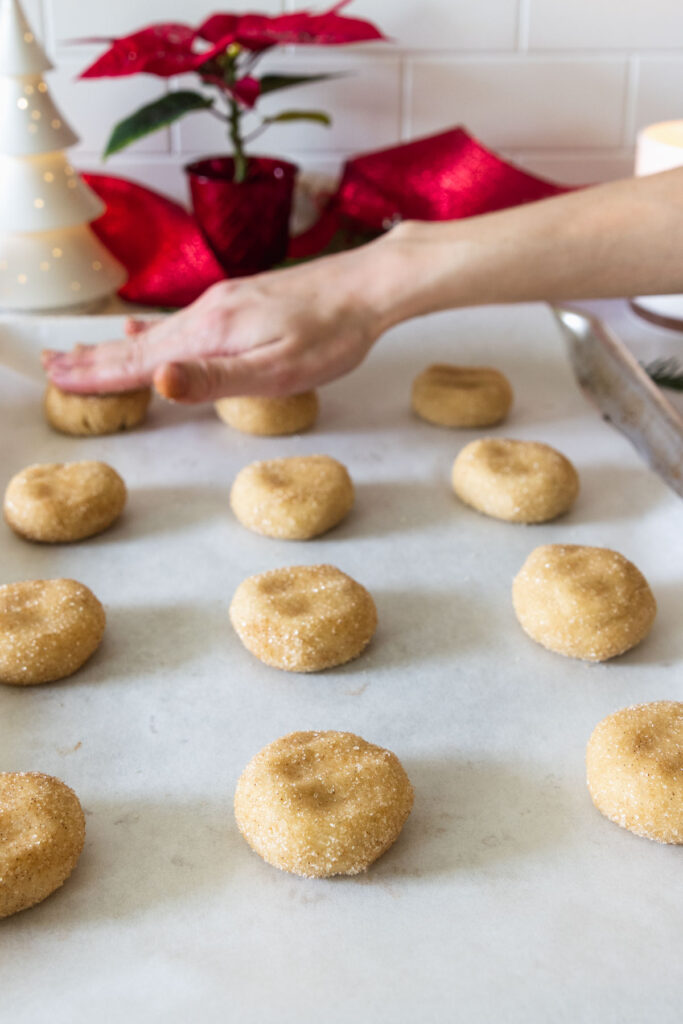 Unbaked vegan snickerdoodle cookies on baking sheet