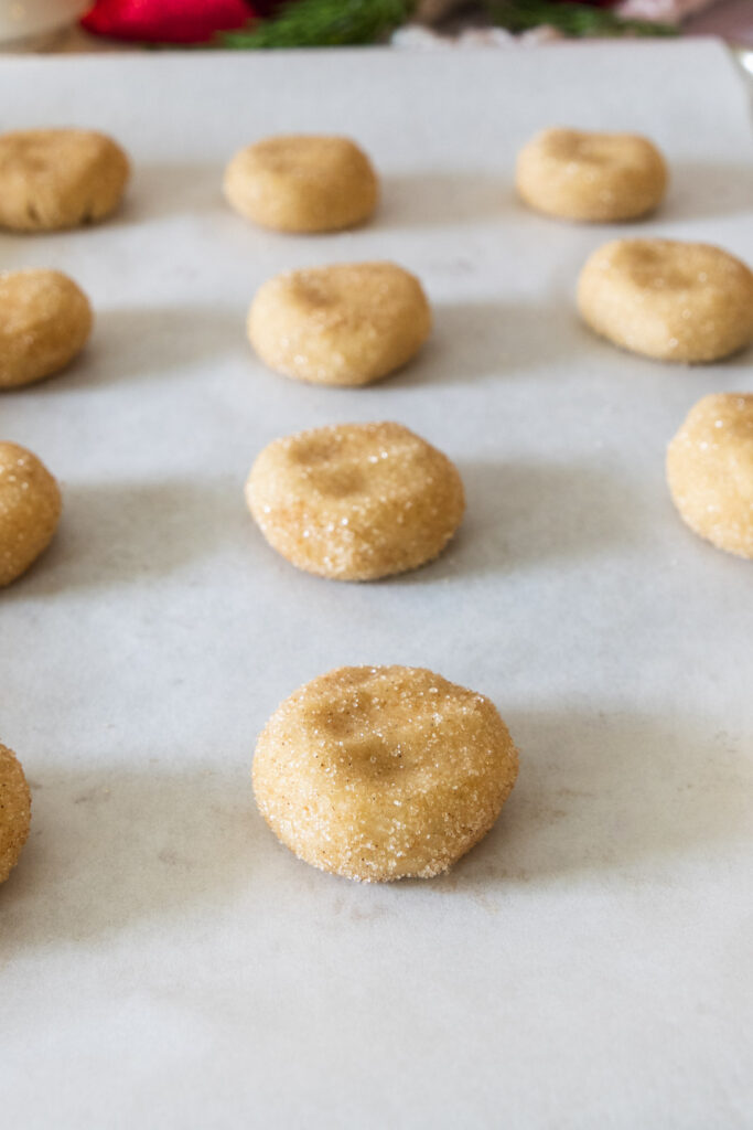 Cinnamon sugar coated cookie dough on baking tray