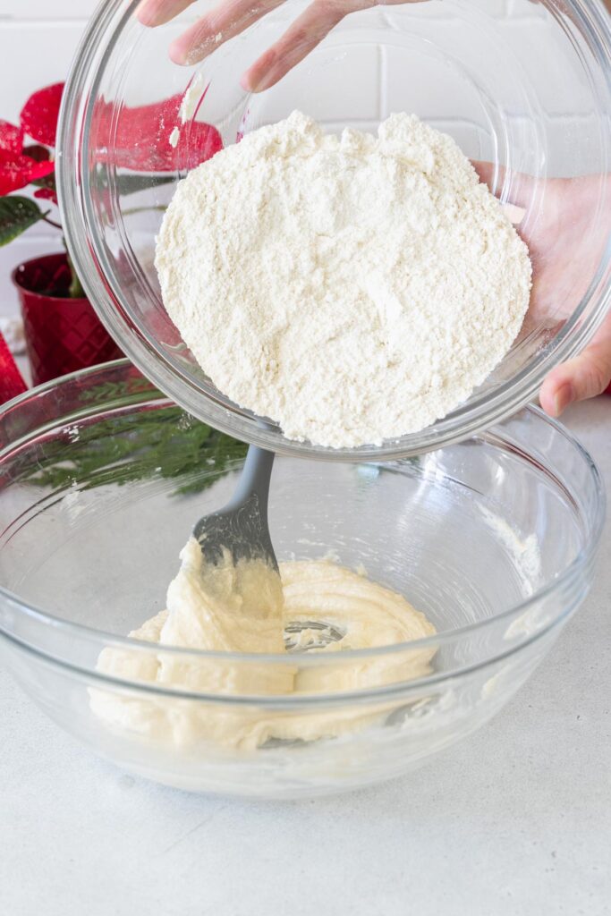 Adding the dry mixture to the wet mixture