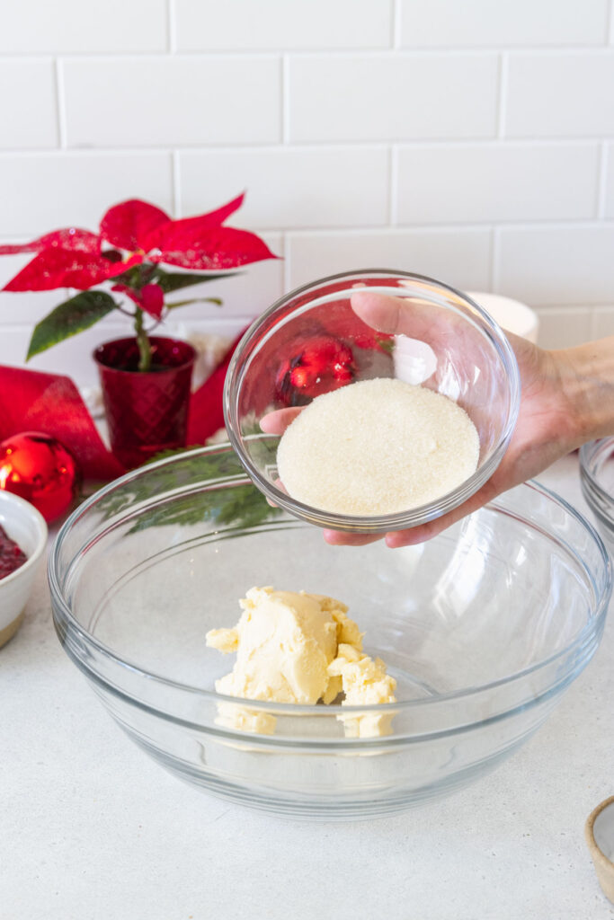 Adding sugar to the margarine before creaming